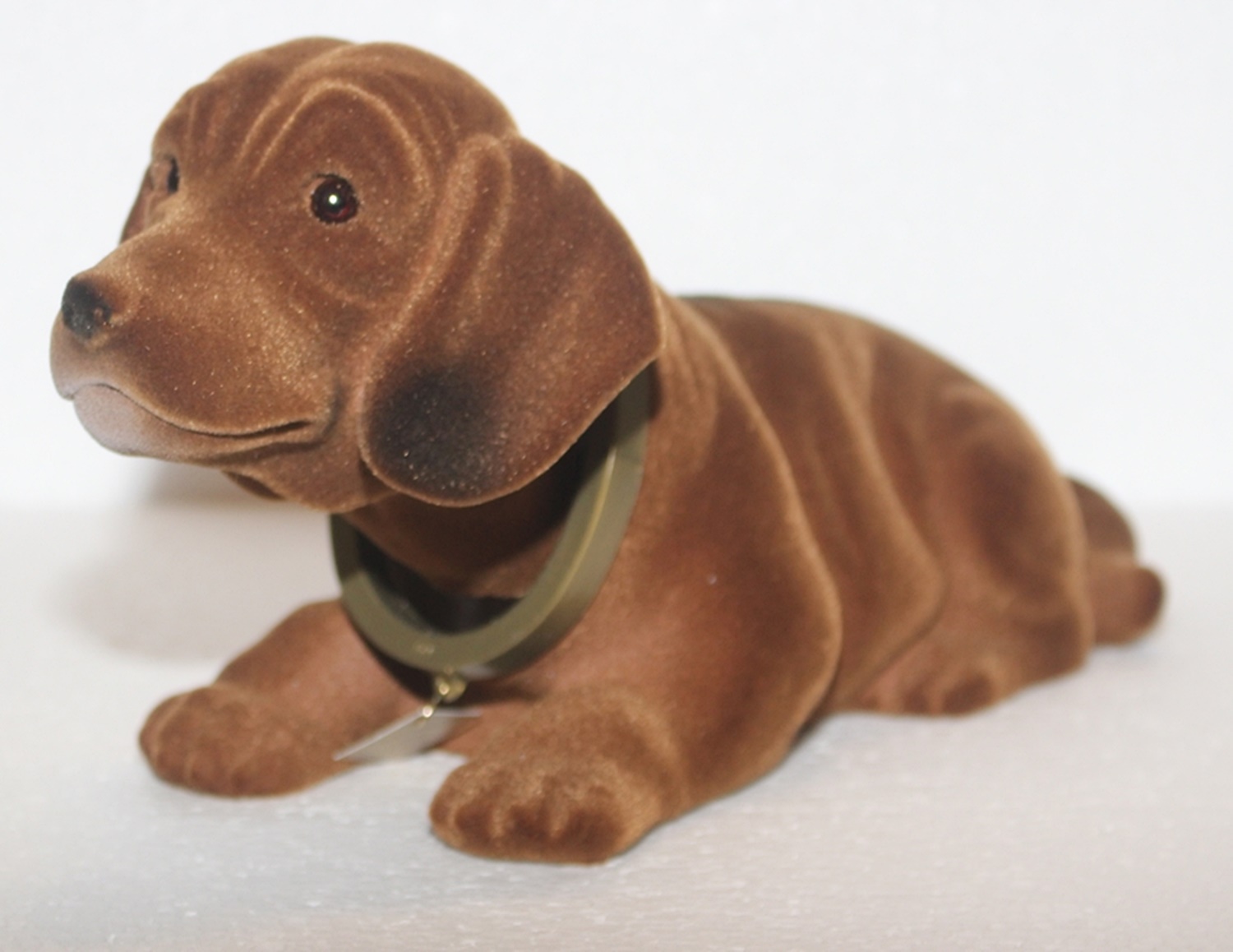 Wackel Dackel Figur Hund Dackel Wackelfigur H 14 cm groß liegend mit Wackelkopf
